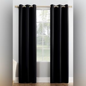 Four (4) black curtain panels. Metal grommets fit rods up to 1.5" in diameter.